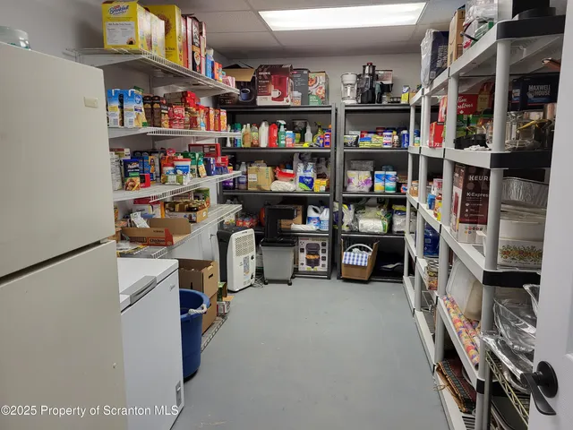 a bathroom with a sink vanity and mirror