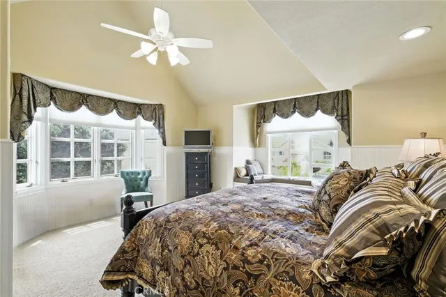 a bathroom with a shower and toilet