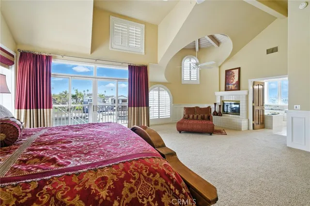 a bathroom with a tub sink and a window