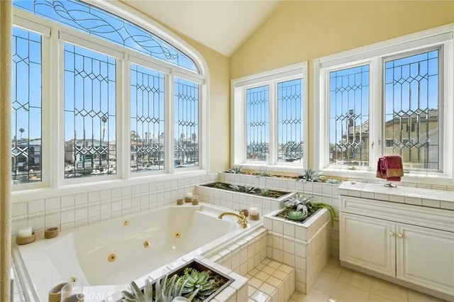 a living room with fireplace furniture and a flat screen tv
