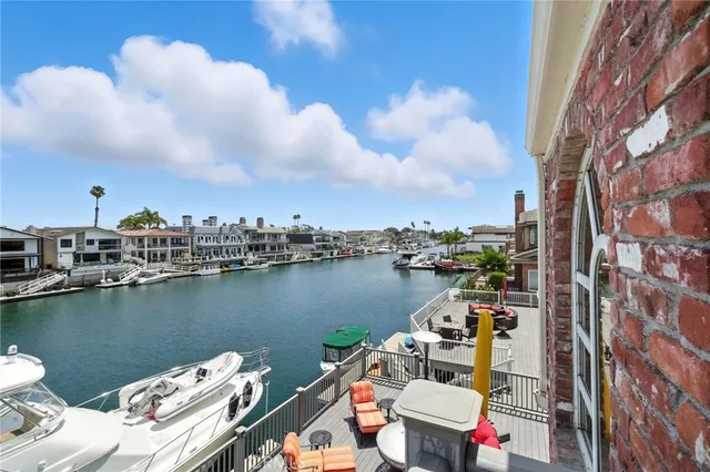 a patio with tables and chairs