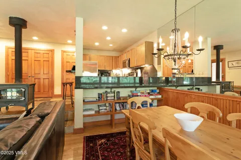 a very nice looking dining room with a table and chairs