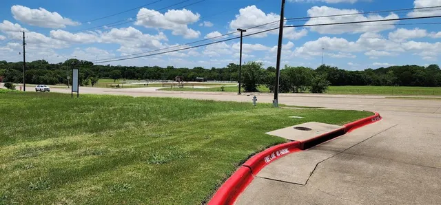 a view of a park with a slide