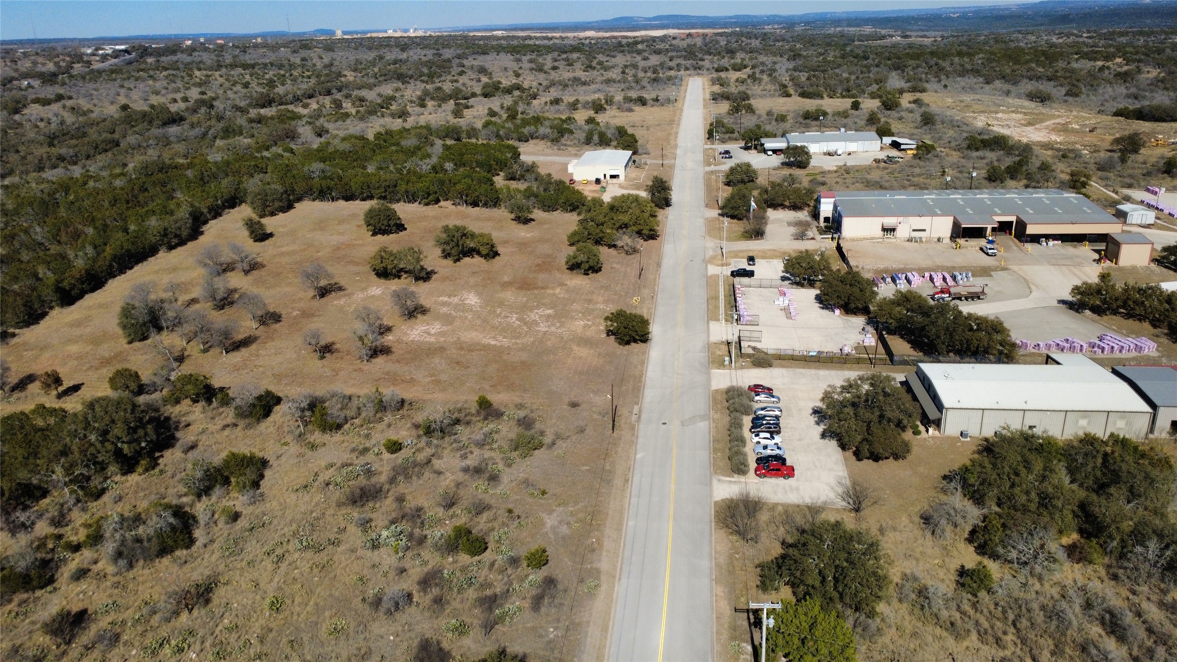 4304 Innovation Loop Marble Falls, TX 78654 - Photo 2 of 6 an aerial view of a house with a yard