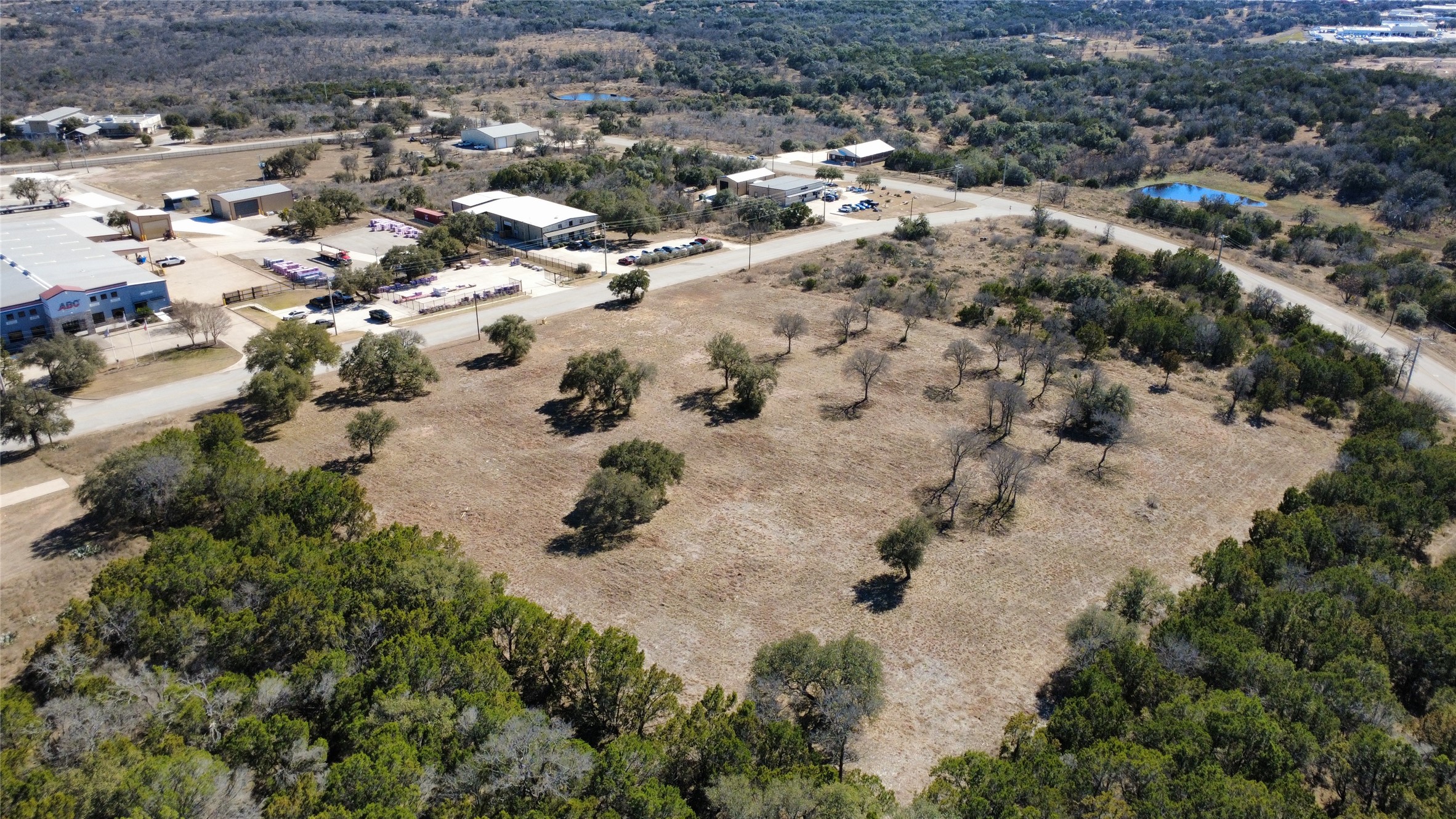 4304 Innovation Loop Marble Falls, TX 78654 - Photo 4 of 6 an aerial view of house with yard
