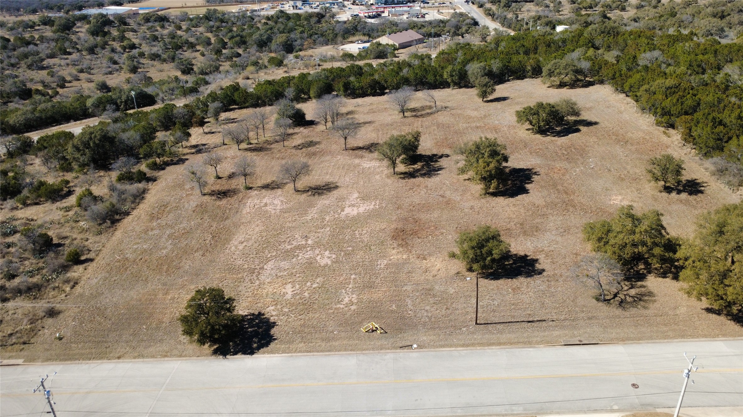 4304 Innovation Loop Marble Falls, TX 78654 - Photo 6 of 6 a view of a backyard of a house