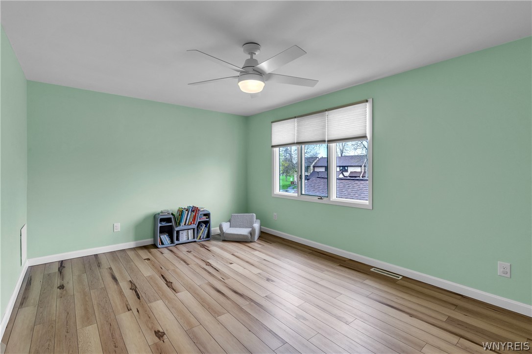 1202 Charlesgate Circle Amherst, NY 14051 - Photo 29 of 35 Luxury vinyl flooring, new ceiling fan