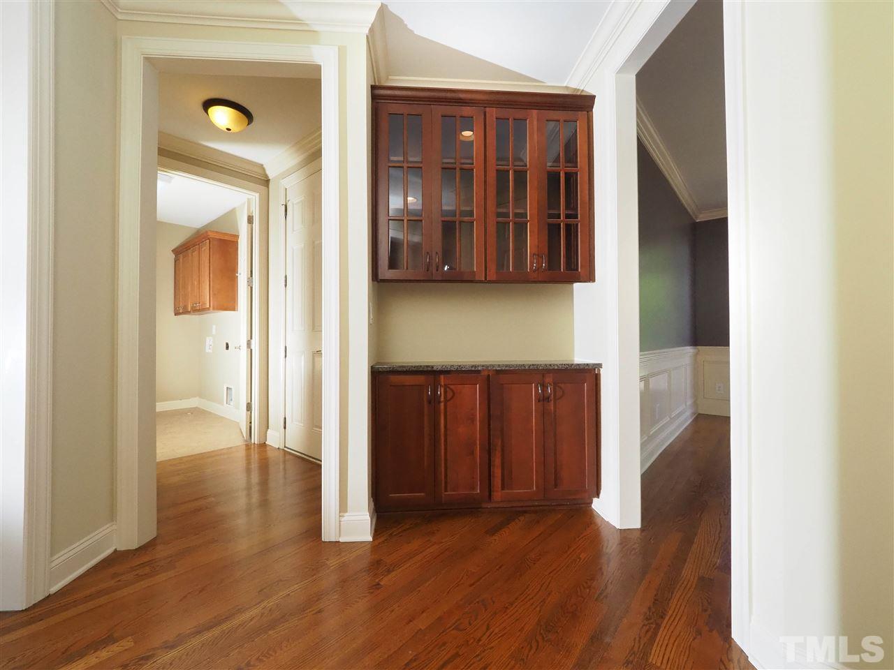11830 Lowery Ridge Drive Raleigh, NC 27614 - Photo 13 of 30 Butler's Pantry between the kitchen and dining room makes entertaining easy!