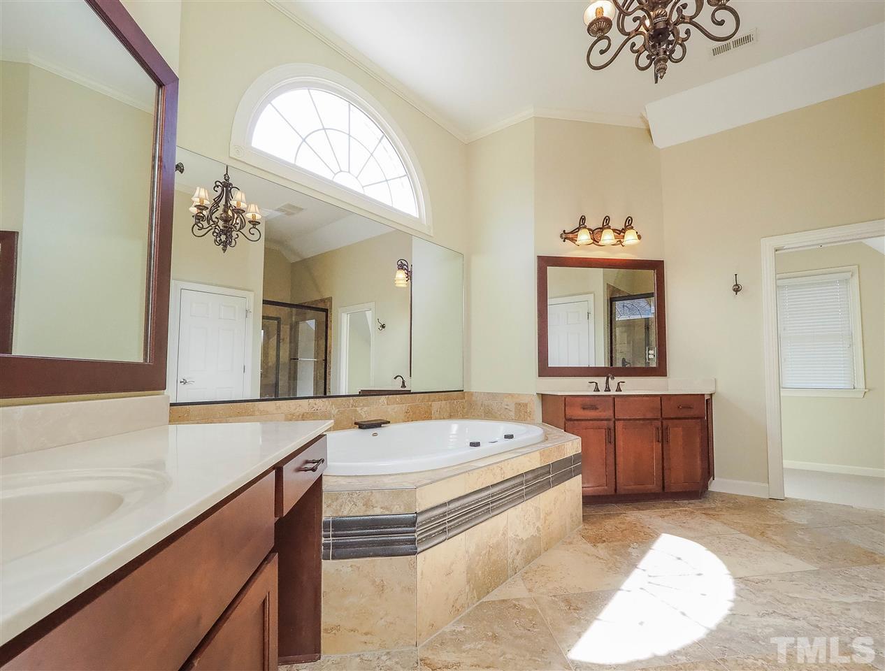 11830 Lowery Ridge Drive Raleigh, NC 27614 - Photo 16 of 30 Amazing Master Bath - separate vanities, jetted tub and separate shower.