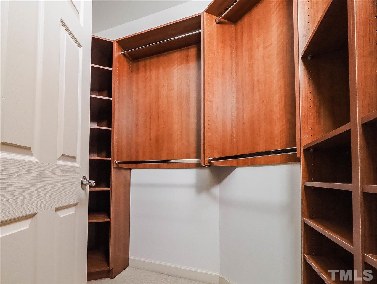 11830 Lowery Ridge Drive Raleigh, NC 27614 - Photo 18 of 30 One of 2 custom shelved closets.
