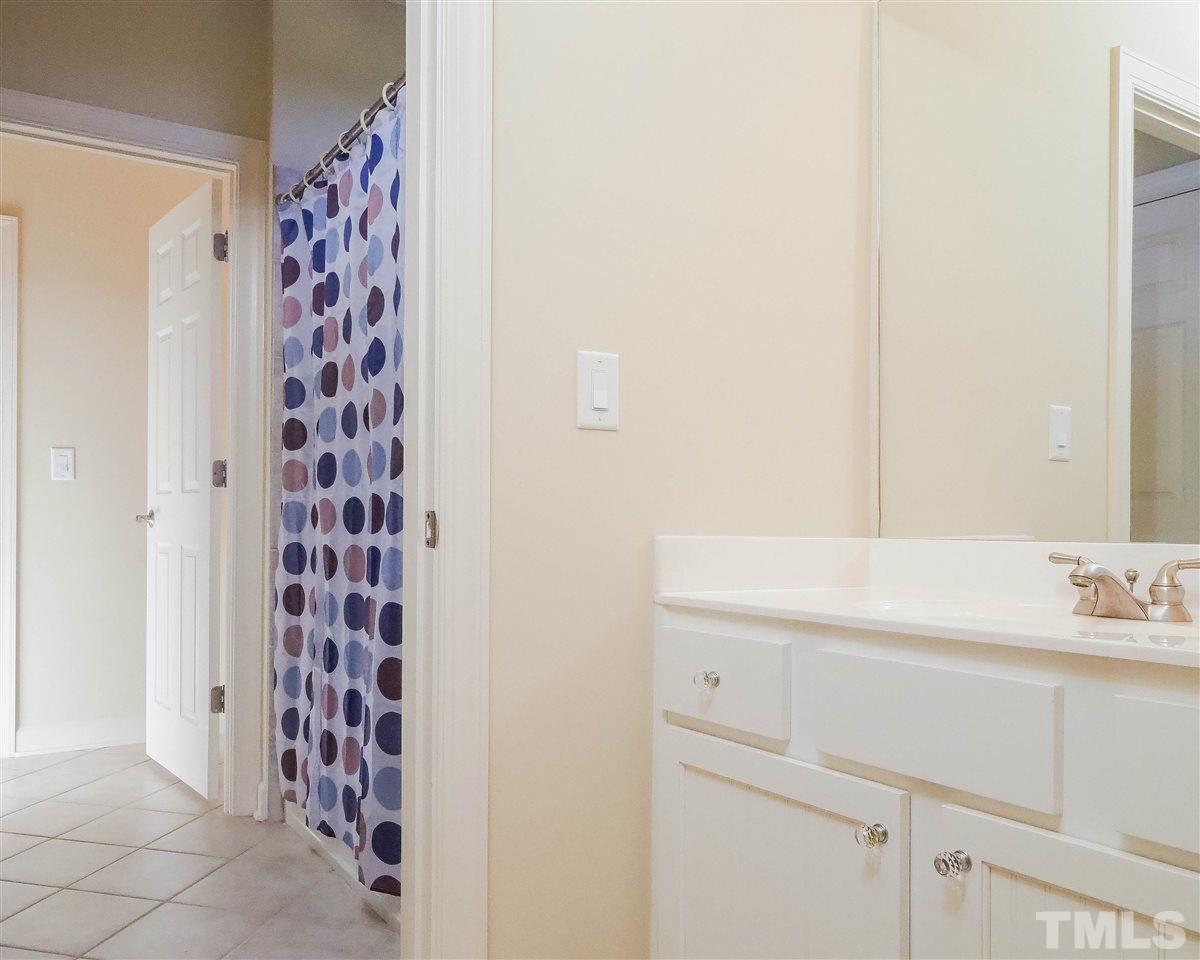 11830 Lowery Ridge Drive Raleigh, NC 27614 - Photo 22 of 30 Buddy Bath with separate vanities on each side of the tub - offers more privacy.