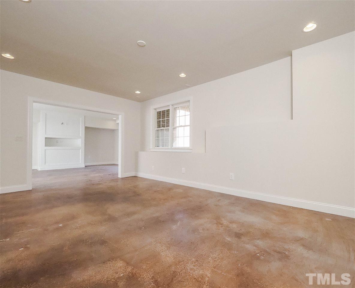 11830 Lowery Ridge Drive Raleigh, NC 27614 - Photo 26 of 30 Fully finished basement has game room, bonus room, 5th Bedroom, Exercise/craft room. Connect a refrigerator to the provided water line!