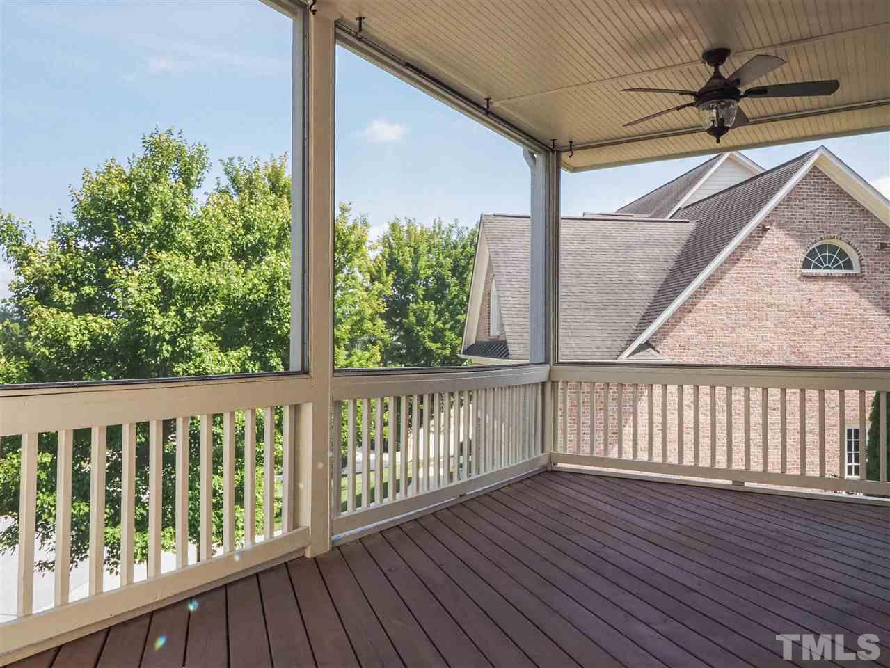 11830 Lowery Ridge Drive Raleigh, NC 27614 - Photo 8 of 30 Screen Porch on the main level - off the family room/living room.