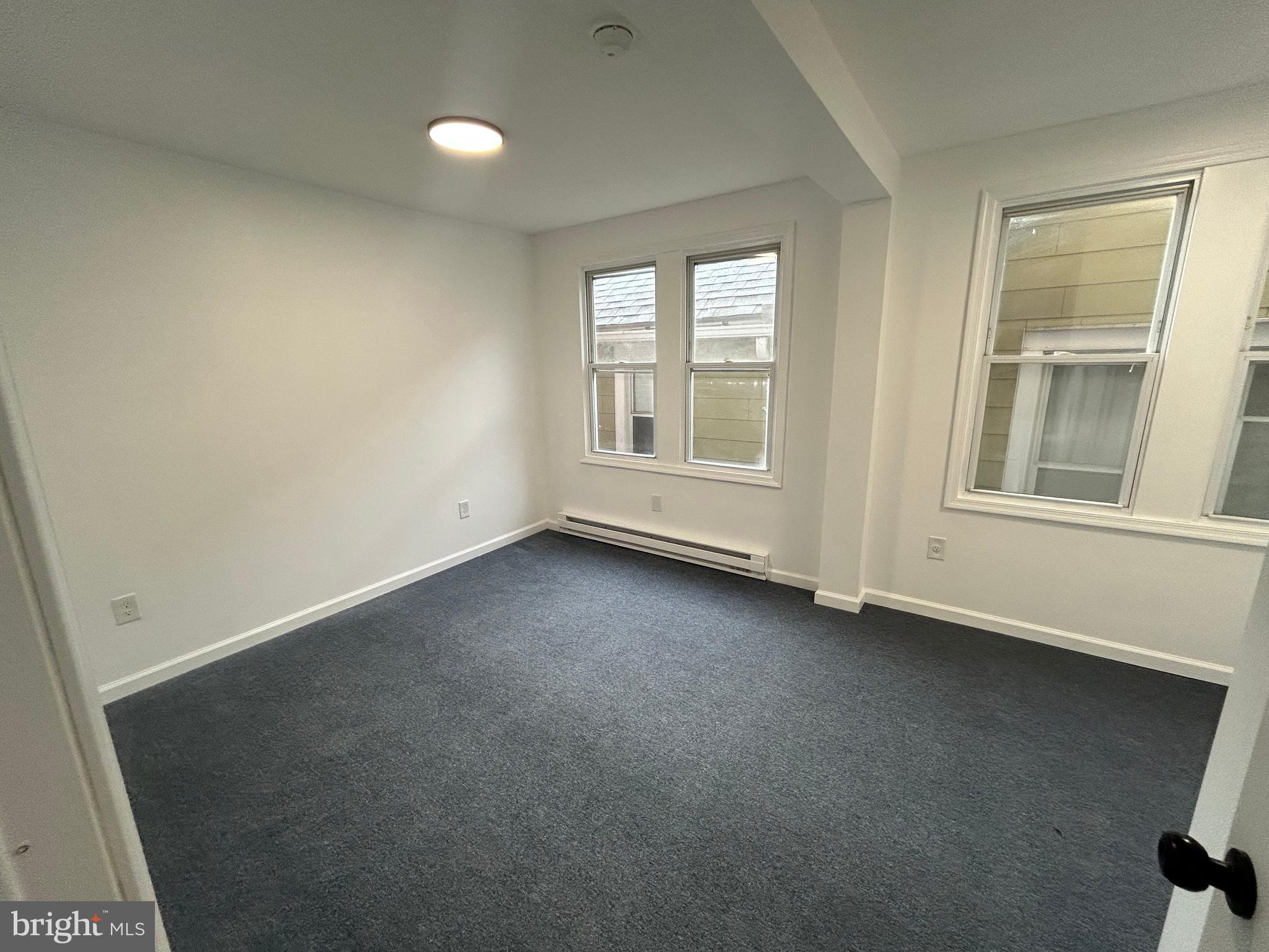 222 West Patterson Street, Unit 4 Lansford, PA 18232 - Photo 5 of 18 an empty room with a window