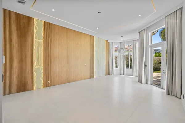 a view of an entryway with a floor to ceiling window