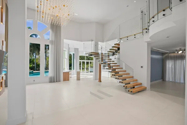 a kitchen with stainless steel appliances a refrigerator and cabinets
