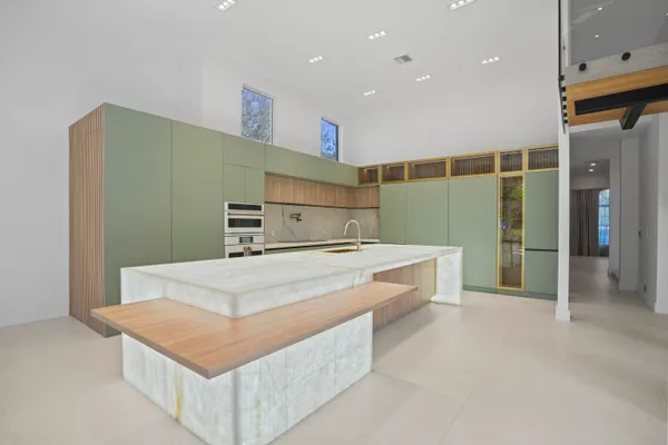 a view of a room with wooden floor and closet