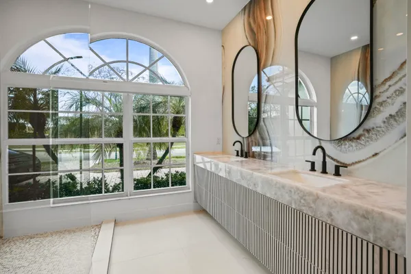 a view of hall way with furniture