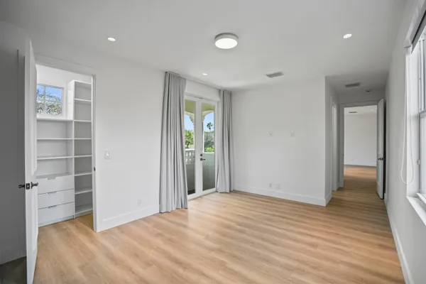 a kitchen with stainless steel appliances granite countertop a sink and a stove