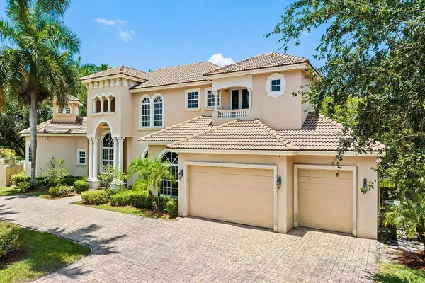 a swimming pool with outdoor seating and yard