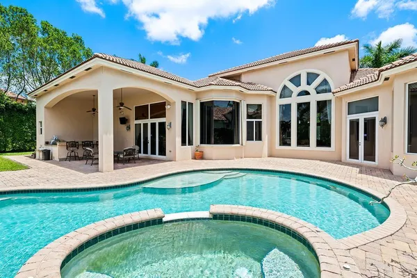 a bedroom with a bed and a walk in closet
