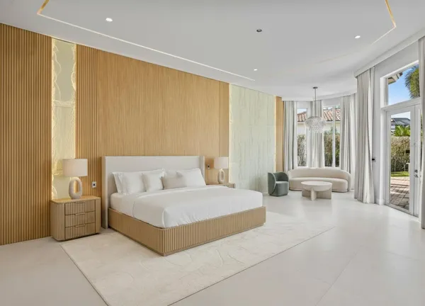 a bathroom with a toilet a sink and shower