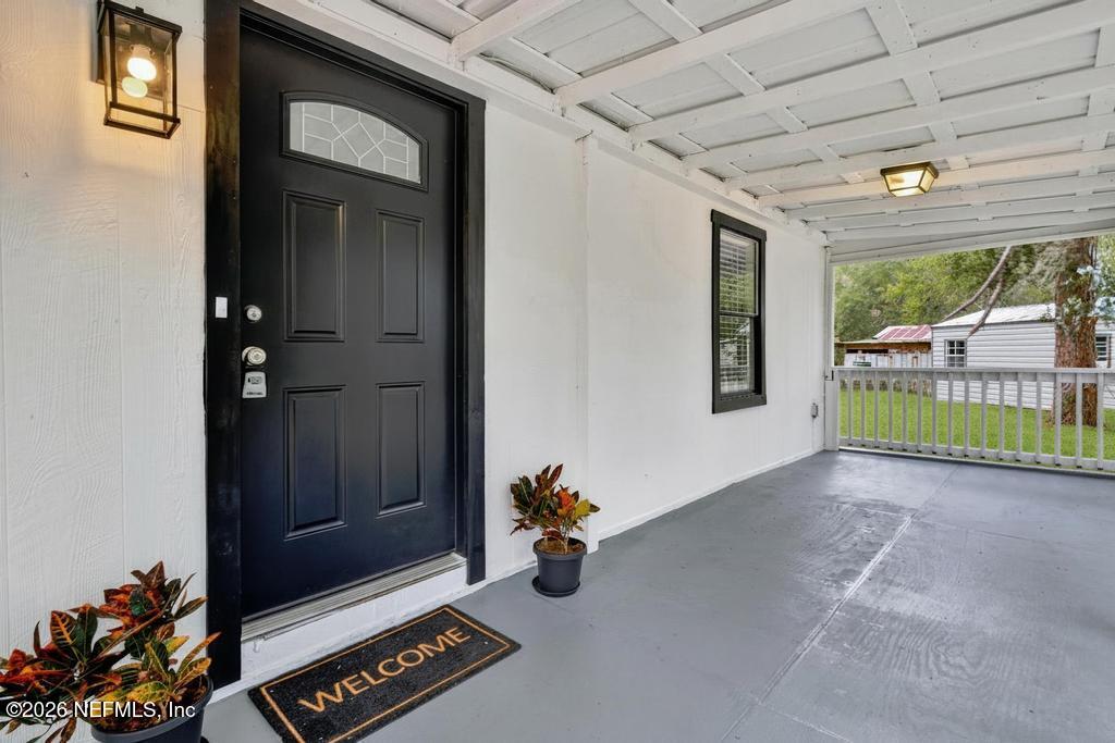 95422 Plum Loop Fernandina Beach, FL 32034 - Photo 13 of 84 a view of livingroom with furniture and floor to ceiling window