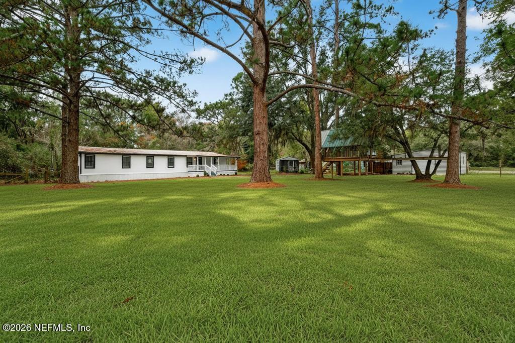 95422 Plum Loop Fernandina Beach, FL 32034 - Photo 3 of 84 a view of a house with a big yard