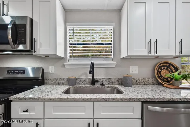 a bedroom with a bed and a walk in closet