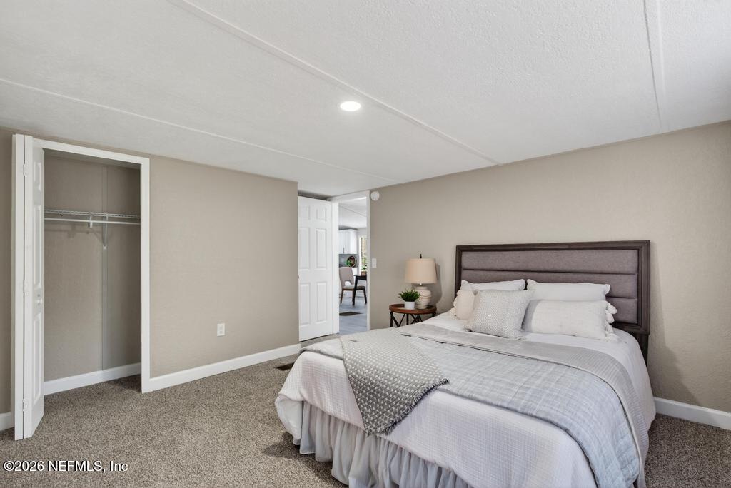 95422 Plum Loop Fernandina Beach, FL 32034 - Photo 43 of 84 a bedroom with a bed and a window