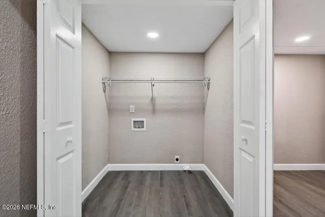 a house that has tree in front of it