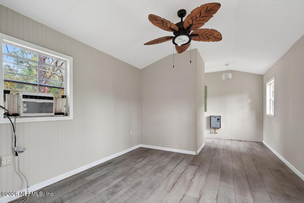 95422 Plum Loop Fernandina Beach, FL 32034 - Photo 64 of 84 a view of empty room with wooden floor and fan