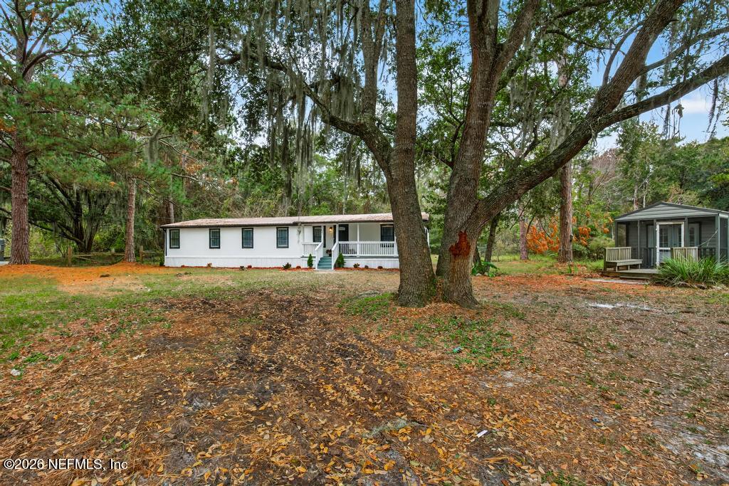 95422 Plum Loop Fernandina Beach, FL 32034 - Photo 81 of 84 a house that has tree in front of it