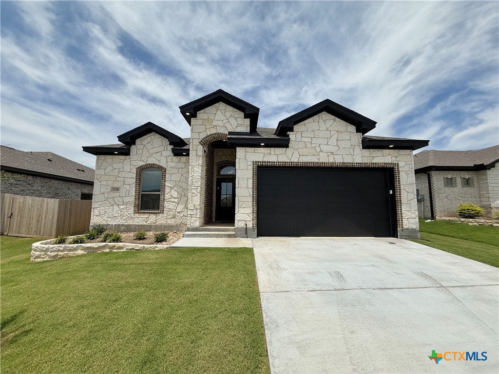 2016 Yarrow Road Temple, TX 76502 - Photo 1 of 30 a front view of a house with a yard