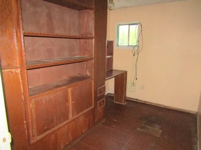 an empty room with a door