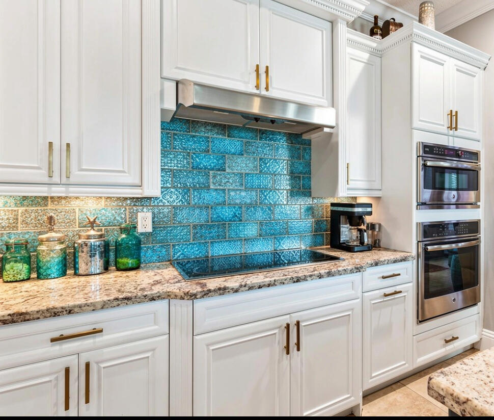 183 Calmo Circle Port St. Lucie, FL 34984 - Photo 13 of 38 a kitchen with stainless steel appliances granite countertop a sink and a microwave