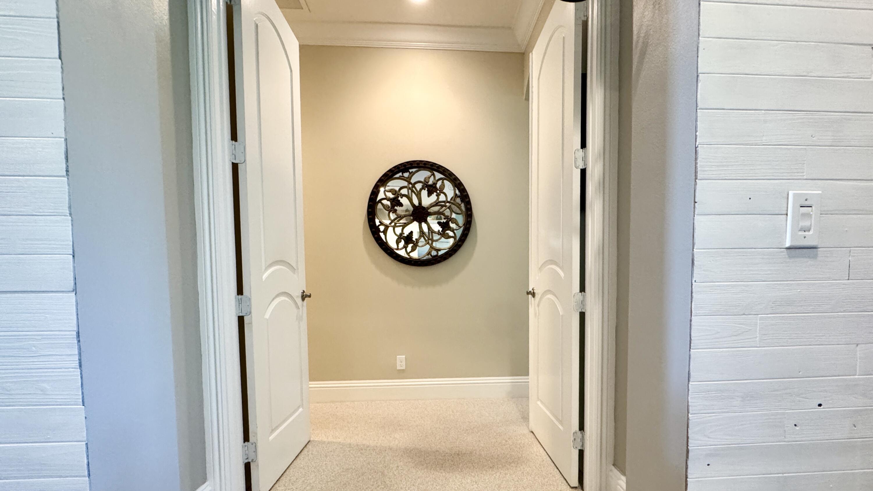 183 Calmo Circle Port St. Lucie, FL 34984 - Photo 16 of 38 a view of a hallway with elevator
