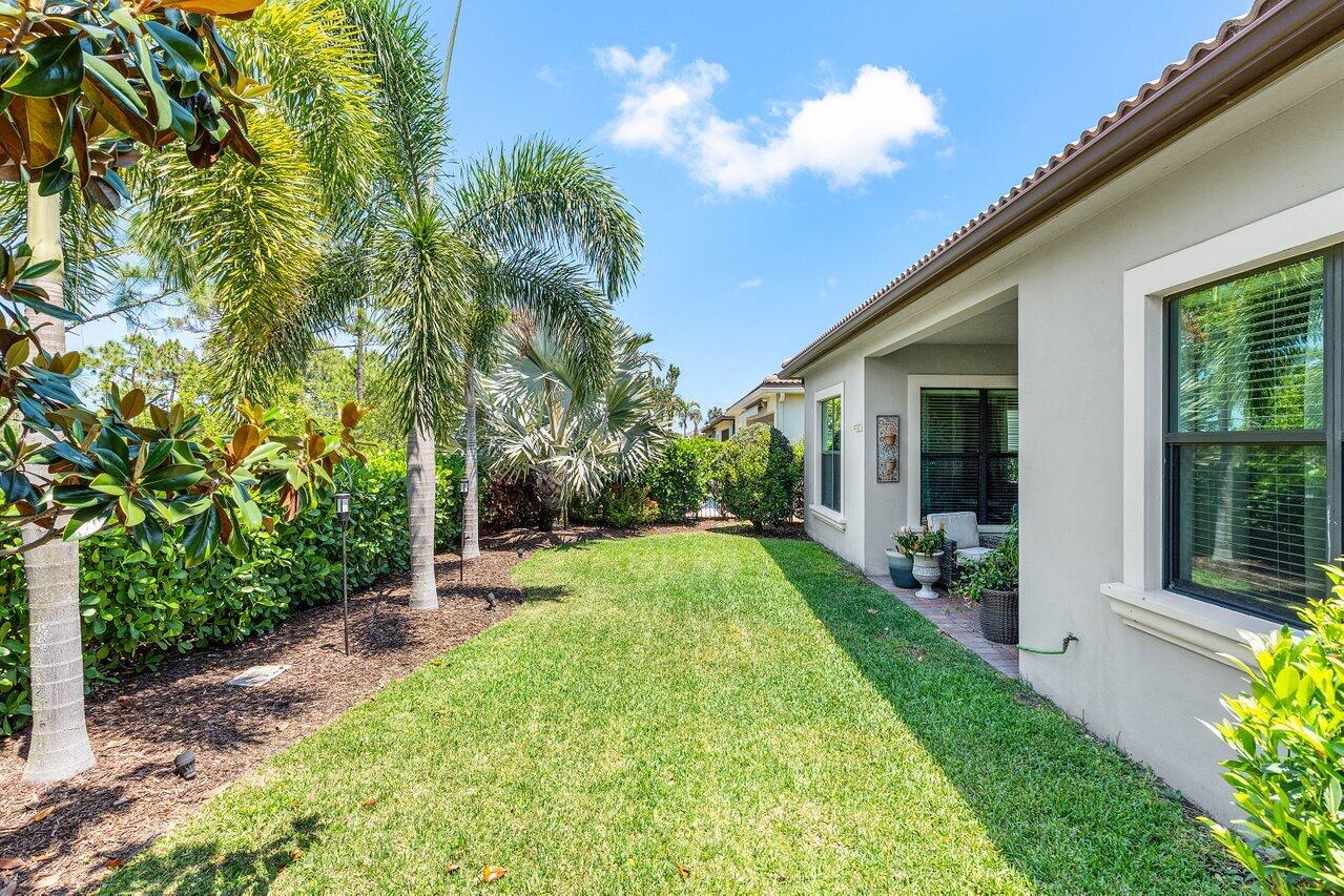 183 Calmo Circle Port St. Lucie, FL 34984 - Photo 33 of 38 a view of back yard of the house