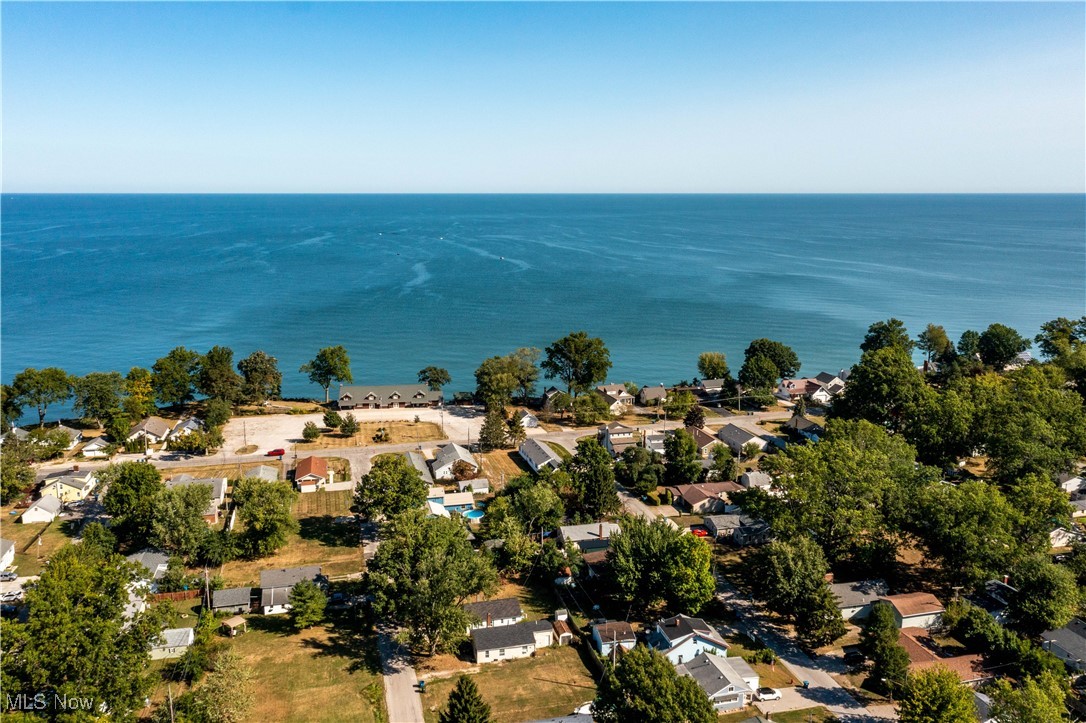 230 Devonshire Road Vermilion, OH 44089 - Photo 3 of 16 Drone / aerial view featuring a water view