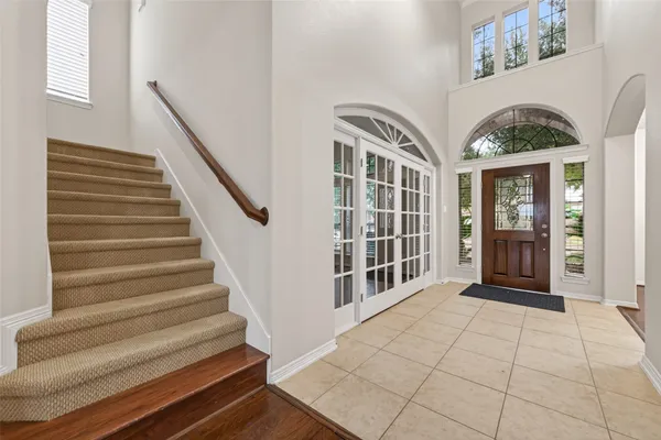 a view of an entryway with staircase