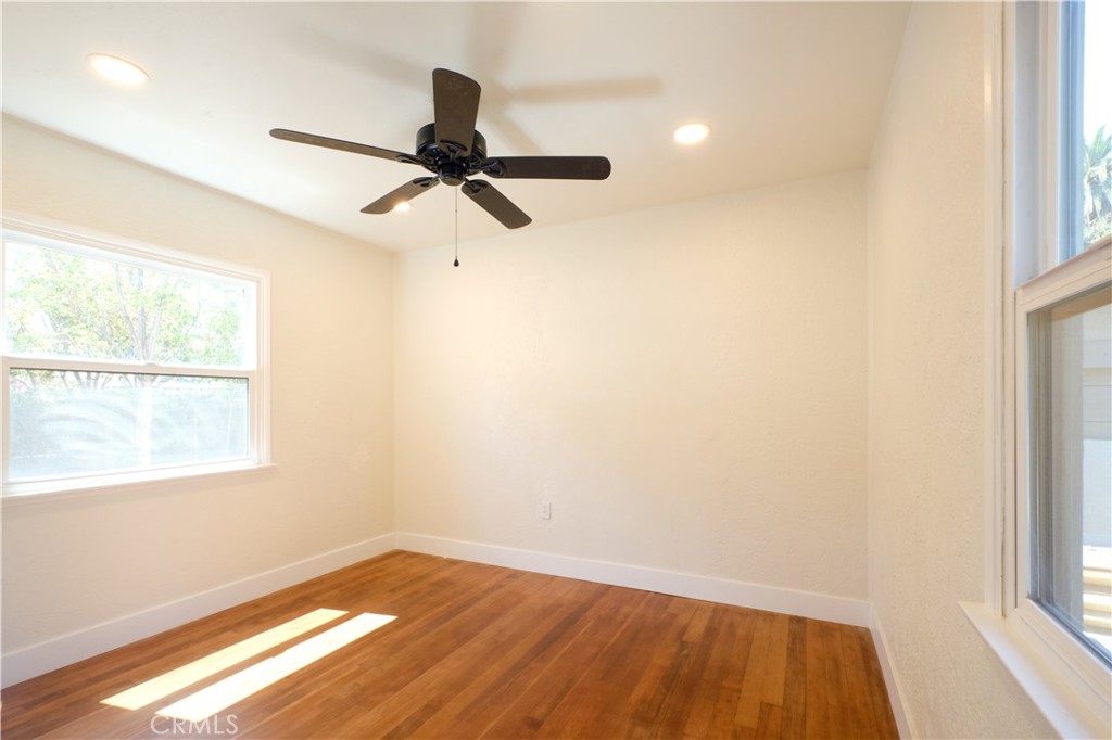 3045 Cedar Street Riverside, CA 92501 - Photo 19 of 25 Bedroom 3 hardwood floor, recessed lighting, backyard view