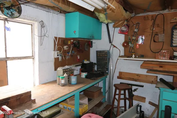 a view of storage and utility room