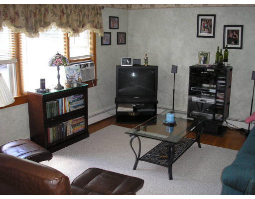 2 Bellvista Road Worcester, MA 01602 - Photo 3 of 11 a living room with furniture and a flat screen tv
