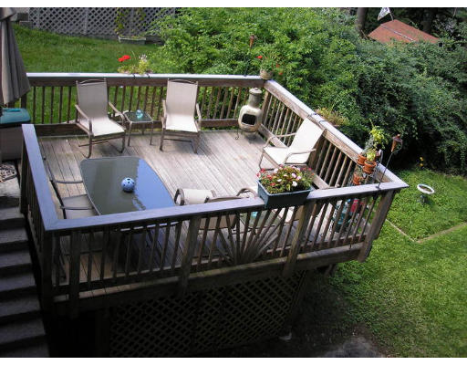 2 Bellvista Road Worcester, MA 01602 - Photo 9 of 11 a view of a deck with two chairs and a table