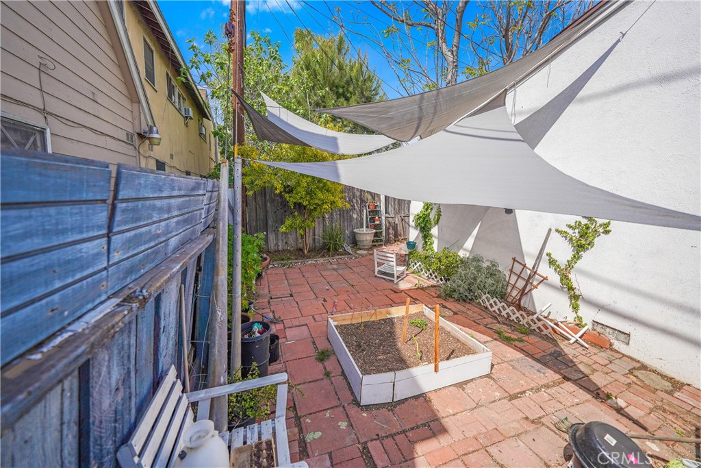 11667 Burbank Boulevard North Hollywood, CA 91601 - Photo 15 of 15 a view of a backyard with sitting area