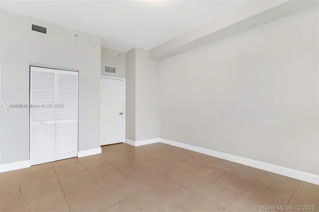 an empty room with an entryway