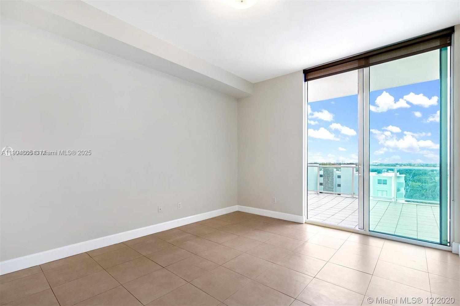 2525 Southwest 3rd Avenue, Unit 605 Miami, FL 33129 - Photo 14 of 19 a view of an empty room and window