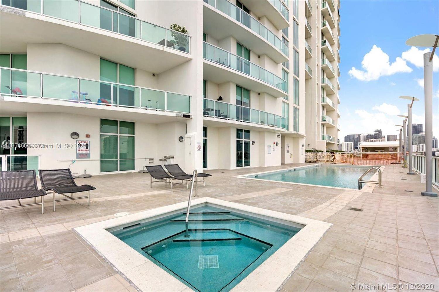 2525 Southwest 3rd Avenue, Unit 605 Miami, FL 33129 - Photo 10 of 19 a view of a building with a swimming pool