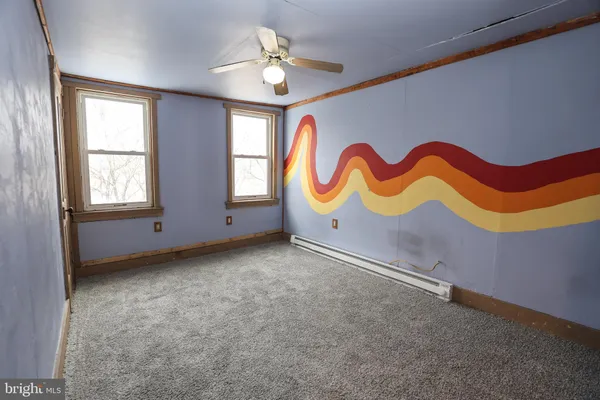 an empty room with windows