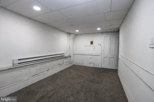 a view of a hallway with entryway